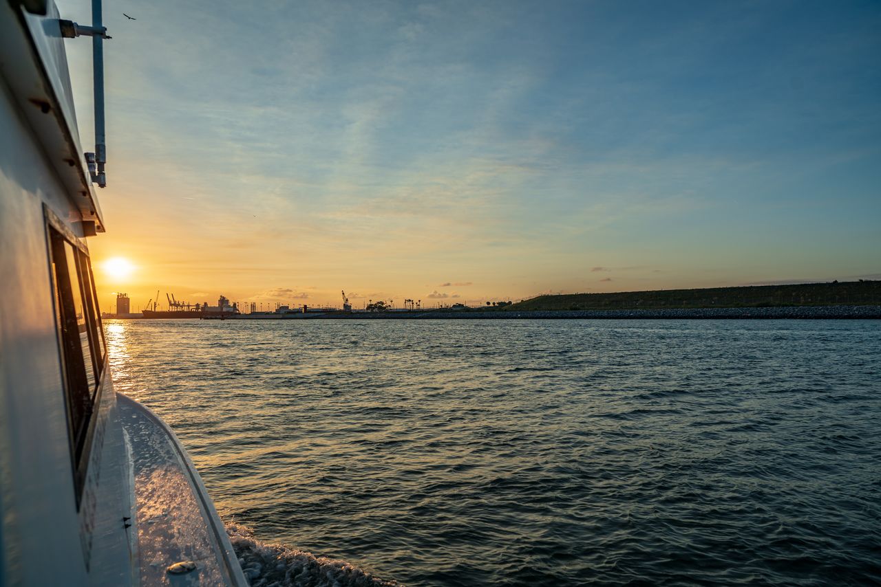 Photo on board TnT 1 heading back to port into the sunset